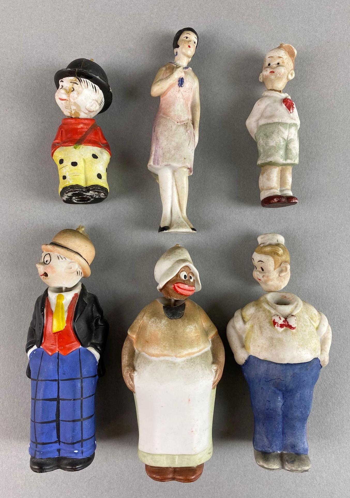 Group of 6 Porcelain Dolls: Includes Auntie Blossom, Rachel, Moon Mullins and more. Made in Germany, 1 head detached, 1 repaired, parts loose, largest measures 3 3/4 X 1 1/2 X 1 inches