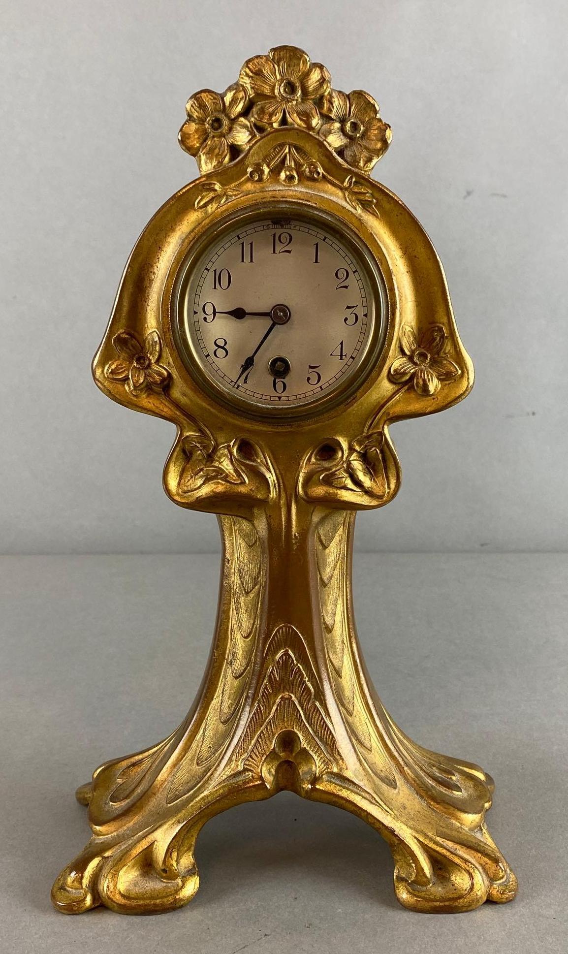 Art Nouveau Gilt Metal Mantel Clock: Not in working condition, Unknown maker, Measures 11 1/2 x 7 x 4in.