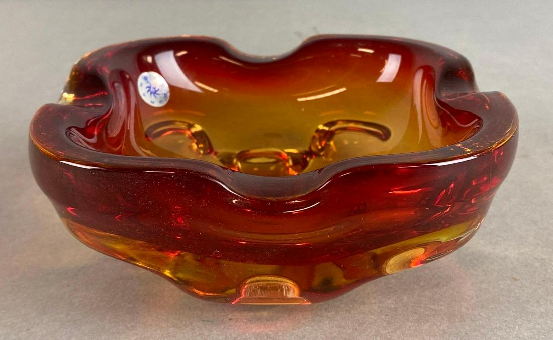 Murano Art Deco Orange Glass Ashtray: Makers sticker on inside, Measures 2 1/2 x 5 1/2 x 5 1/2in.