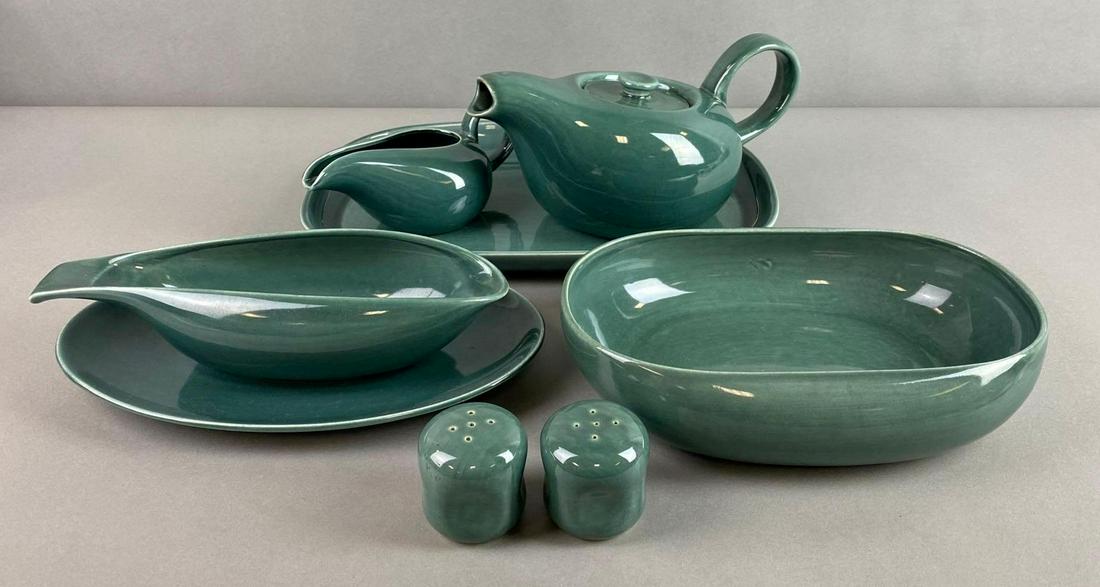Russel Wright Steubenville 7 Piece Dish Set: Includes teapot, creamer, shakers, and more. Crazing, bottoms marked, some cracks, largest measures 13 1/2 X 9 X 1 1/4 inches
