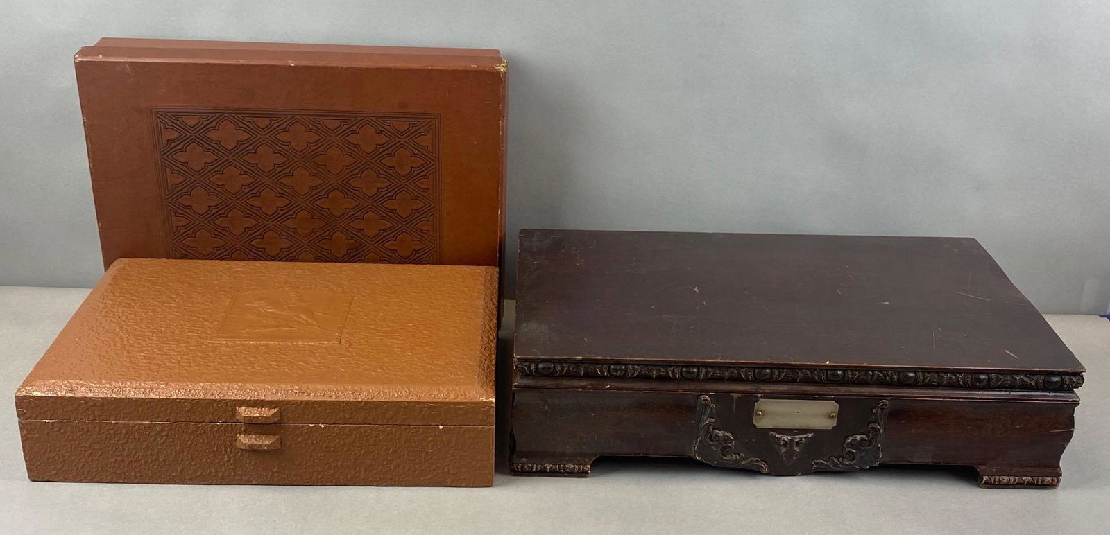 Group of 2 Flatware Cases: One with original box. Largest measures 5 x 19 1/2 x 12 inches. One marked Nakens Anti Tarnish Silverware Set