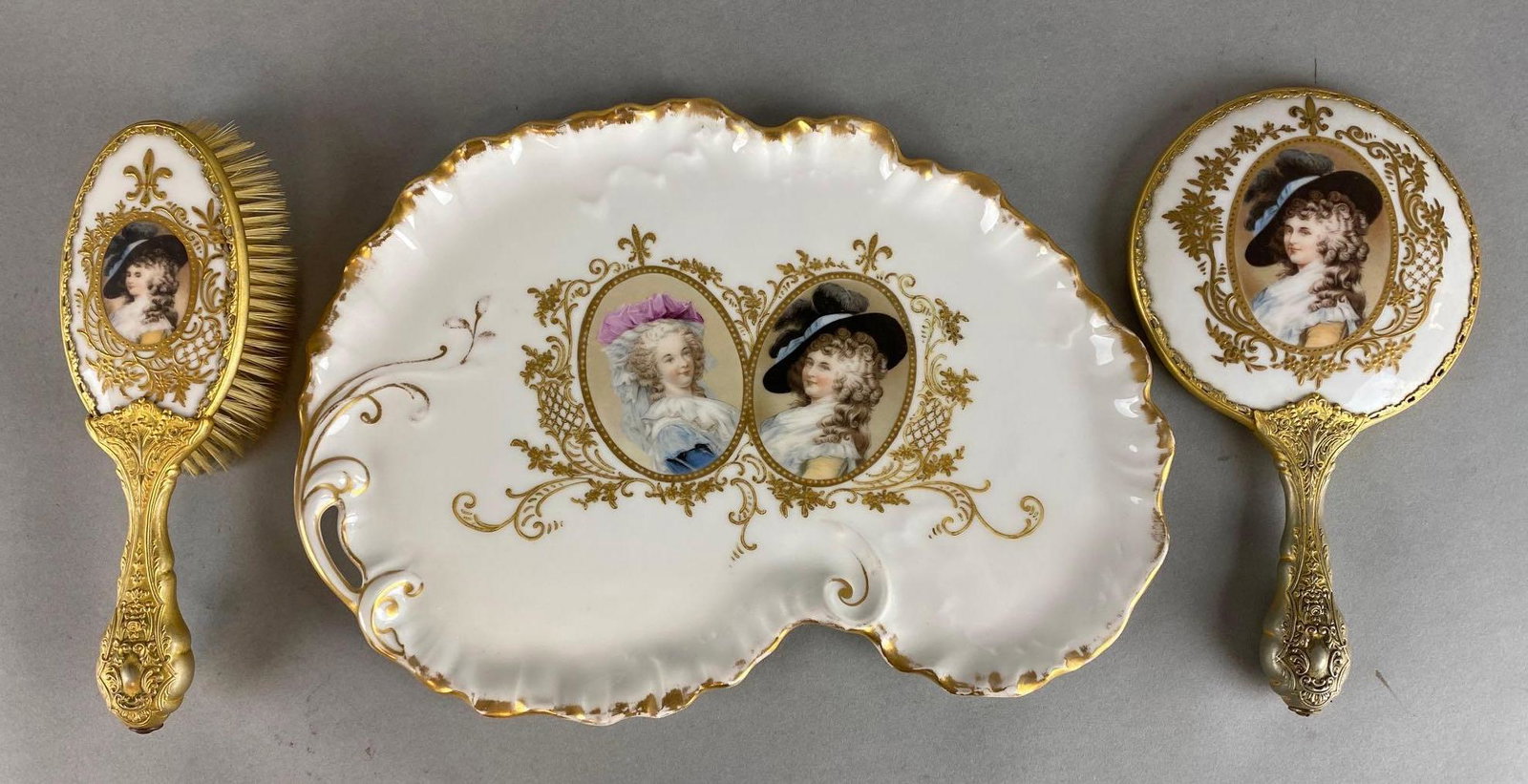 Limoges French Porcelain Dresser Set: Includes tray, hairbrush, and hand mirror, Made in France, Tray measures 9 1/2 x 13 x 1/2in.
