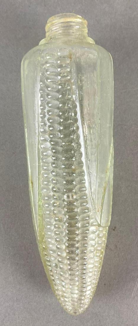 Clear Glass Corn Flask: Missing topper, Measures 6 1/2 x 2 x 2in.