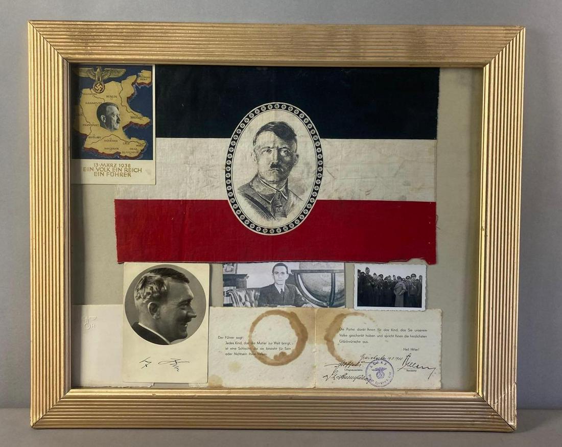 German Style Adolf Hitler Collage with Signature NO COA: Adolf Hitler facsimile Signature. Also includes signed documents from Joseph Goebbels (NO COA). Includes letterhead with AH, photograph, flag, and more. Frame measures 19 3/4 x 23 1/2 inches. There is