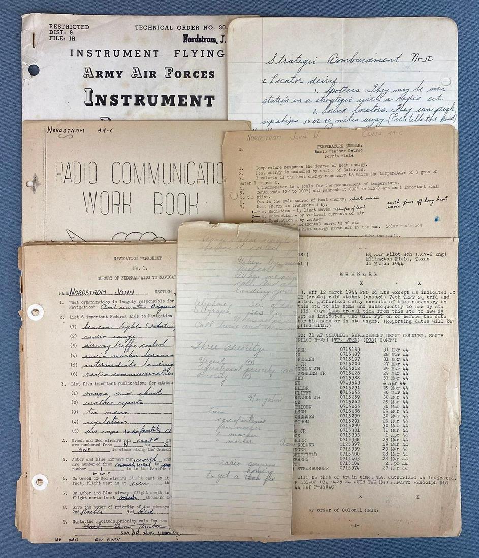 Group of WW2 Military Ephemera: includes navigation worksheets, Radio communication workbook, instrument flying, and more
