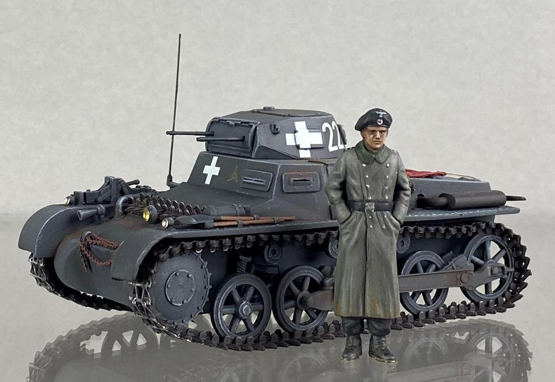 WW2 German Pzkpw IA Tank Custom Painted Model: custom painted by Bill Cook. With Solider figure. Measures 2 1/2 x 4 1/2 x 2 1/4 inches. Used in Poland in 1939.