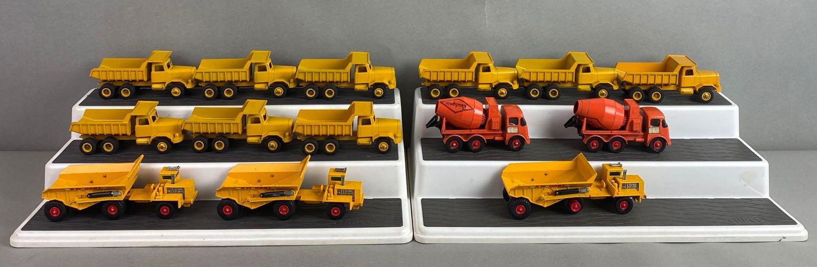 Group of 14 Assorted Die-Cast Vehicles: includes Matchbox Dump Truck, Matchbox Ready - Mix Concrete Truck, and Winross. Largest measures 2 x 5 1/2 x 2 inches