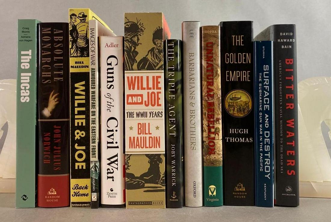 Group of 12 Assorted Military Books: Bookends not included. Includes Bitter Waters, Guns of the Civil War, Willie and Joe, and more.