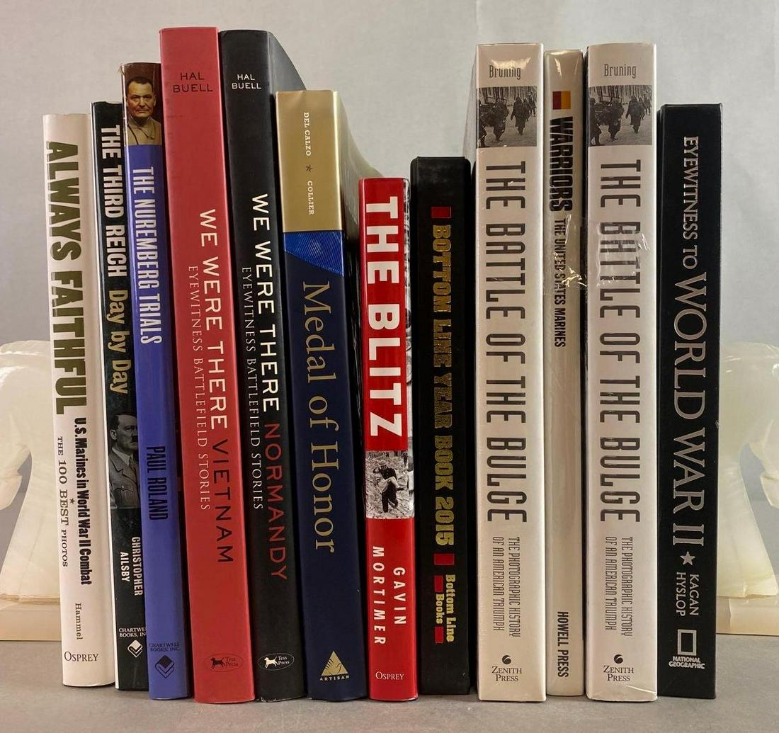 Group of 12 Assorted Military Books: Bookends not included. Includes The Blitz, Always Faithful, The Nuremberg Trials, and more.