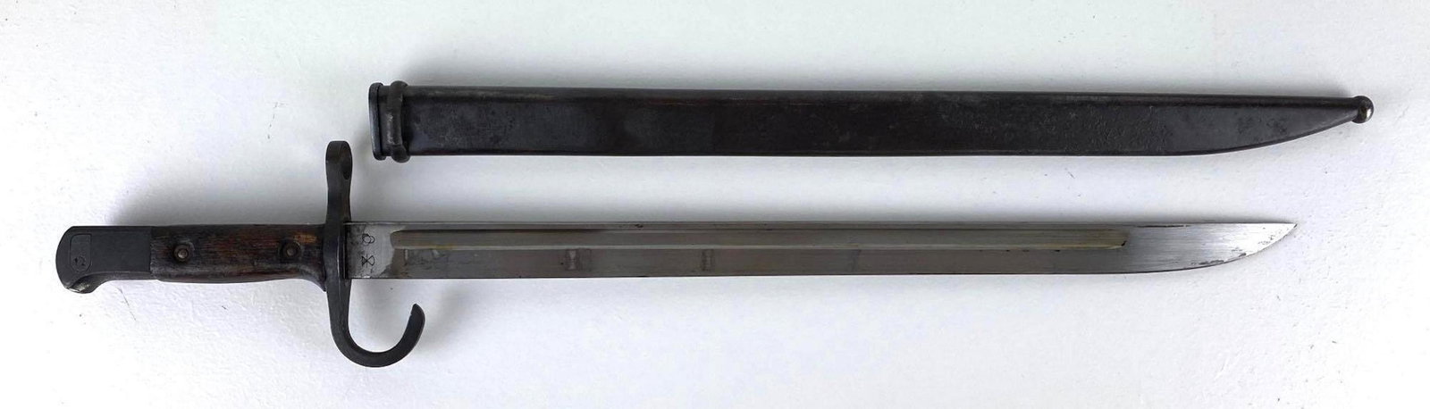 WW2 Japanese Bayonet with Scabbard: Hikari Seiki Seisaku marking, measures 20 3/4 inches long with scabbard