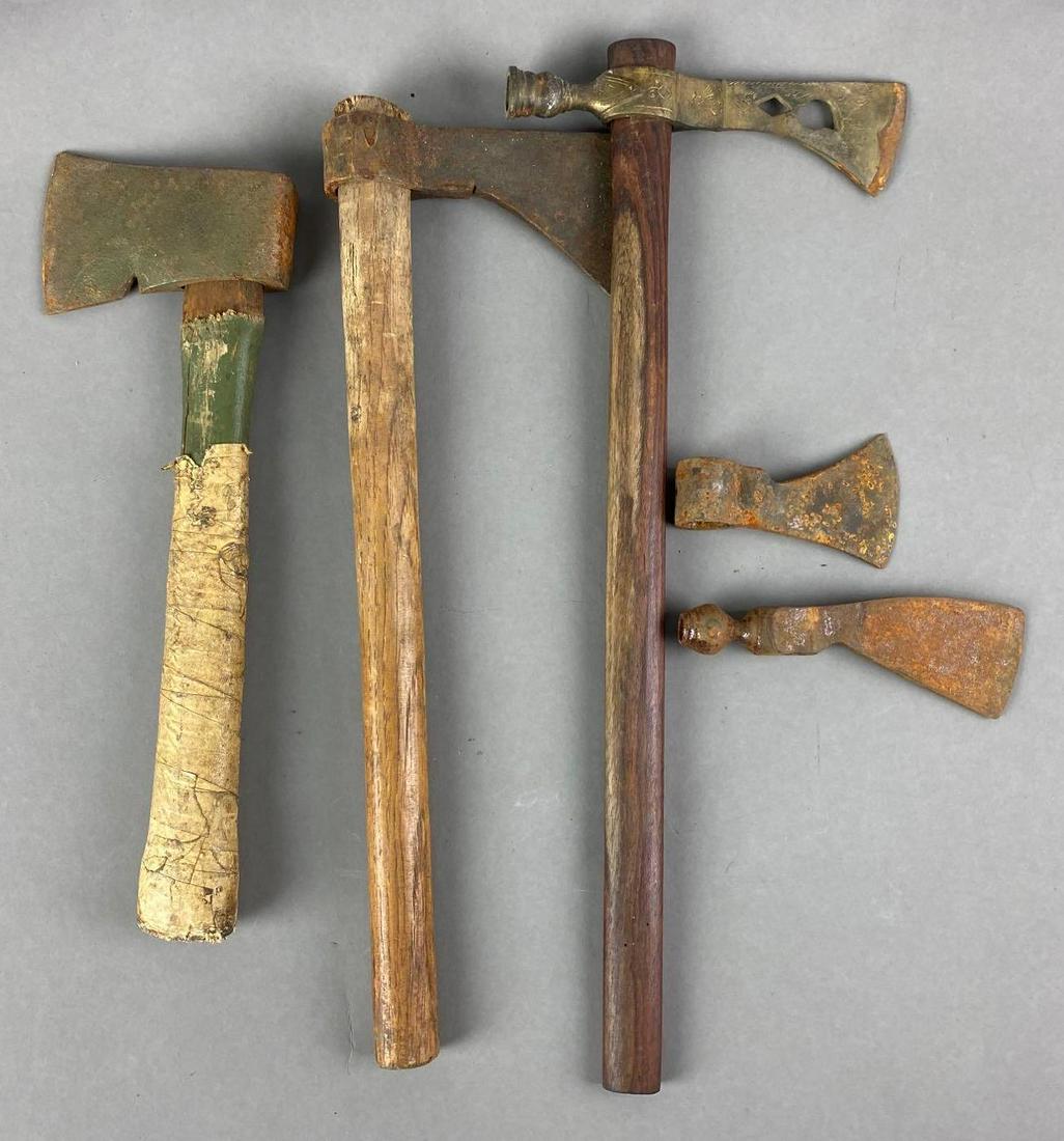 Group of 5 Axes and Axe Heads: One engraved. Largest measures 19 1/2 x 7 1/2 inches. Some Rusty, one cracked .