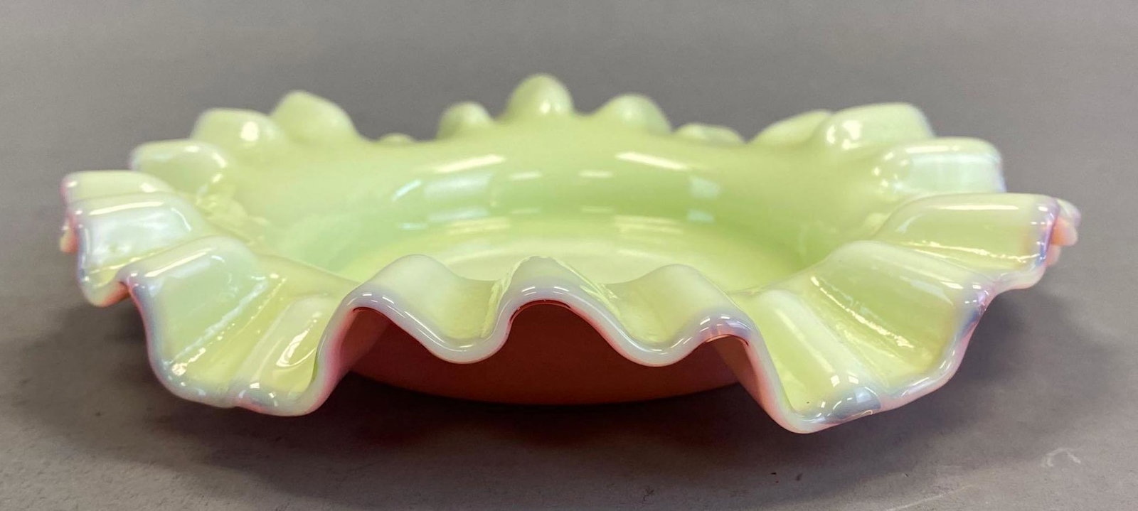 Pink and Yellow Cased Glass Fairy Lamp Plate: Ruffle ribbon edge, Polished pontil mark, Measures 1 1/4 x 6 1/2 x 6 1/2in.