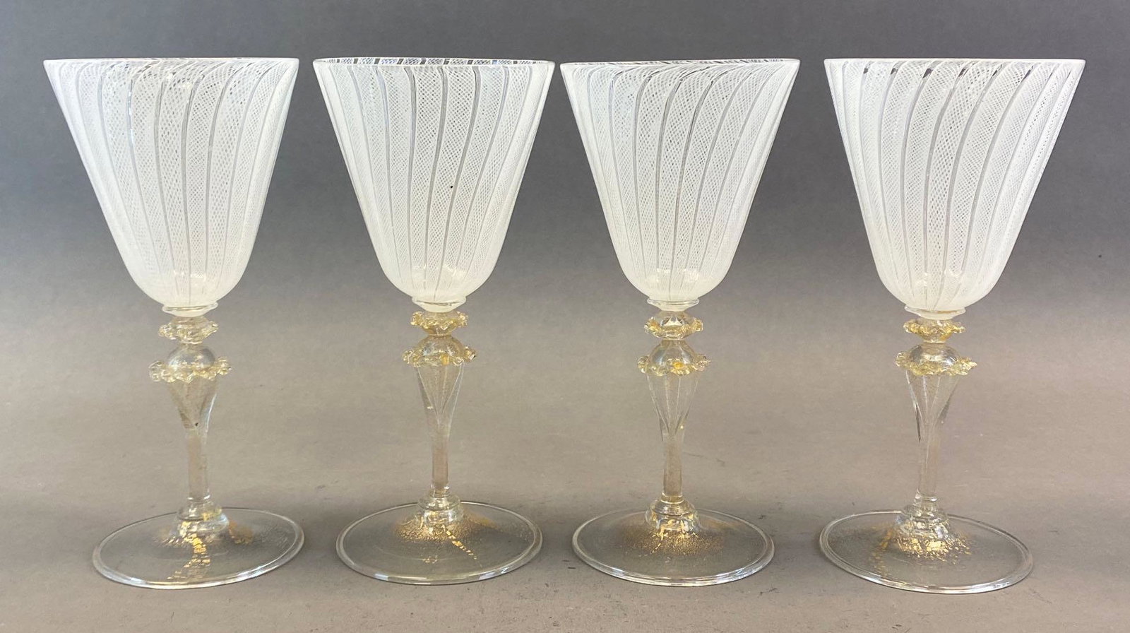 Set of 4 Latticono Aventurine Glass Wine Glasses: With applied ruffle edge accents around stems, Some black spots, All measure 7 3/4 x 3 1/4 x 3 1/4in.