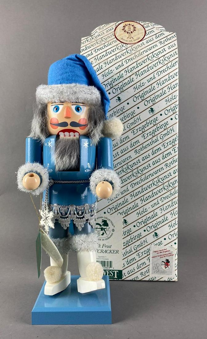German Ore Mountain Jack Frost Christmas Nutcracker: easel does not stay in hand, missing paint brush. Measures 13 x 3 1/2 x 4 inches. Original box.