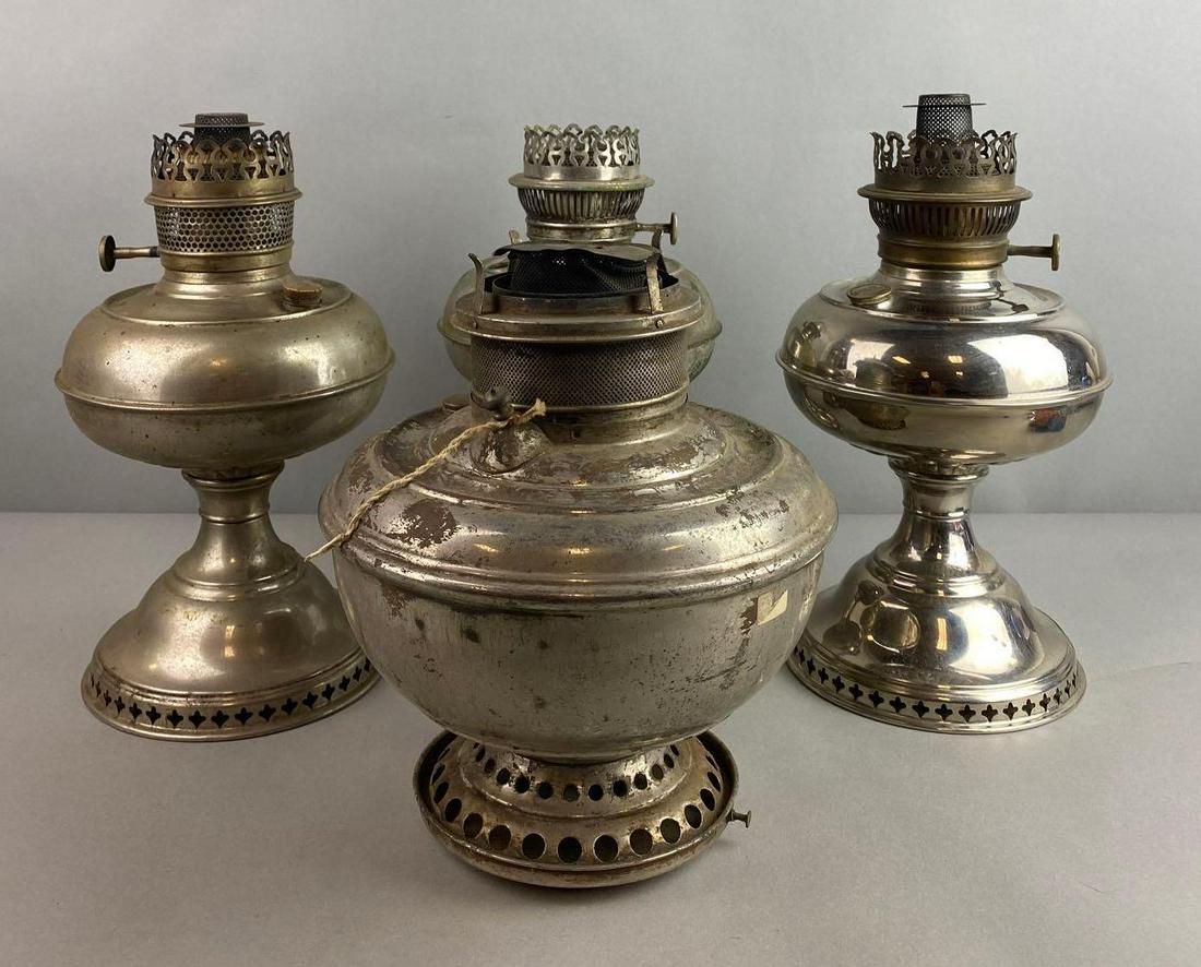 Group of 4 Vintage Metal Oil Lamps: Tarnishing, condition consistent with age, largest measures 12 3/4 X 6 1/2 inches