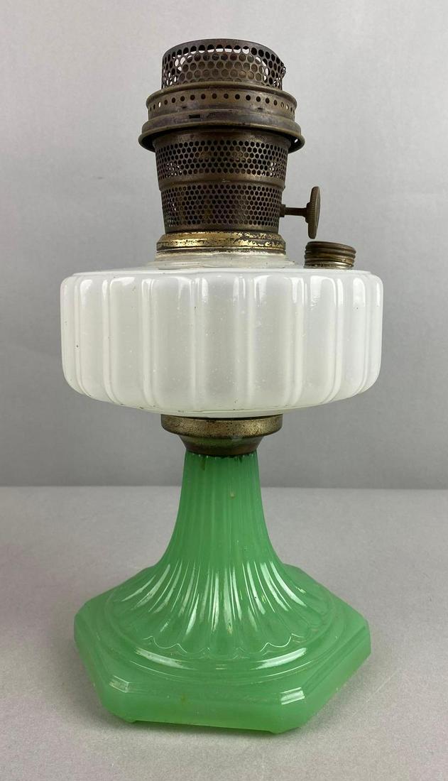 Aladdin Jadeite Corinthian Oil Lamp: Condition consistent with age, measures 12 1/2 X 6 1/2 inches