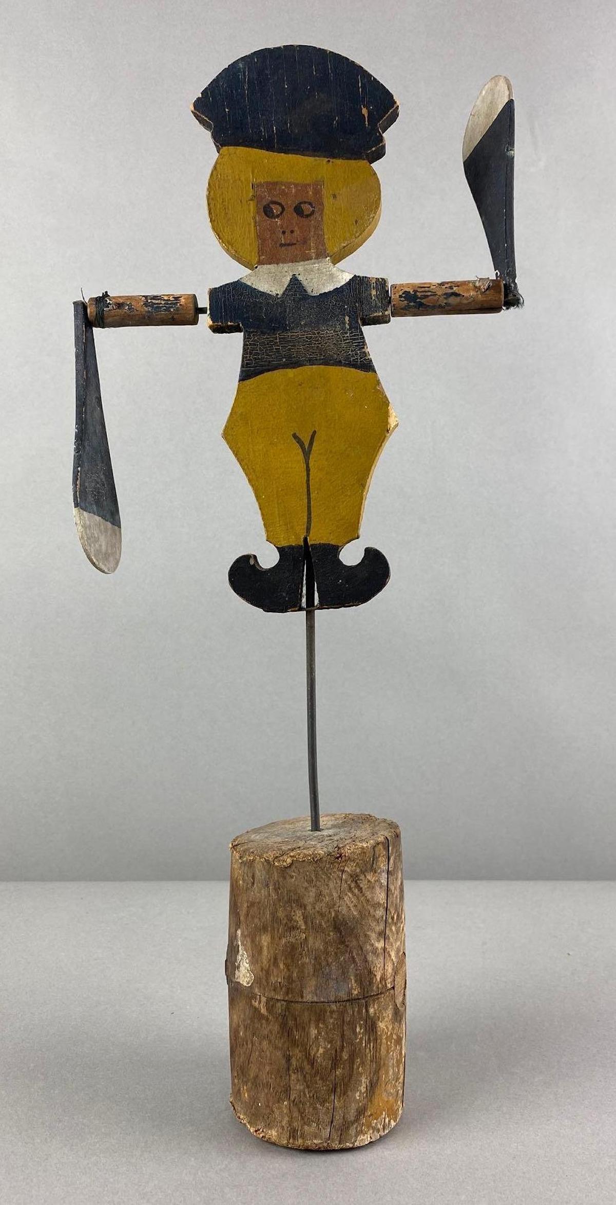Primitive Folk Art Blonde Child Miniature Weathervane Whirligig: Wood. Arms spin. Measures 17 x 7 x 2 1/2 inches