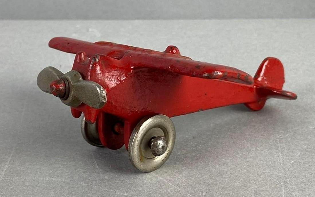 Vintage Hubley Cast Iron Lindy Plane: Bottom marked, some paint chipping, measures 1 1/4 X 3 1/4 X 3 1/2 inches