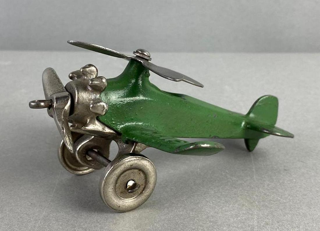 Vintage Hubley Cast Iron Giro Plane: Bottom marked, condition consistent with age, measures 2 1/4 X 3 3/4 X 4 1/2 inches