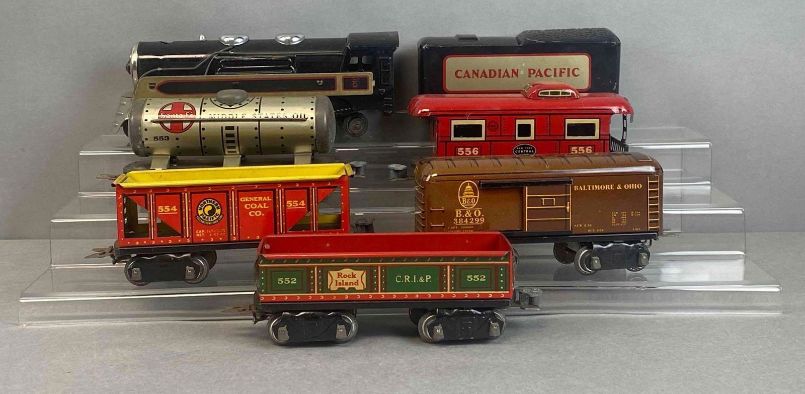 Marx MAR Lines Automatic Coupler Stream Line Steam Type Electrical Train Set: Louis Marx Co. original box. Includes train cars, track, and more. 554 train car measures 2 1/2 x 7 x 2 inches