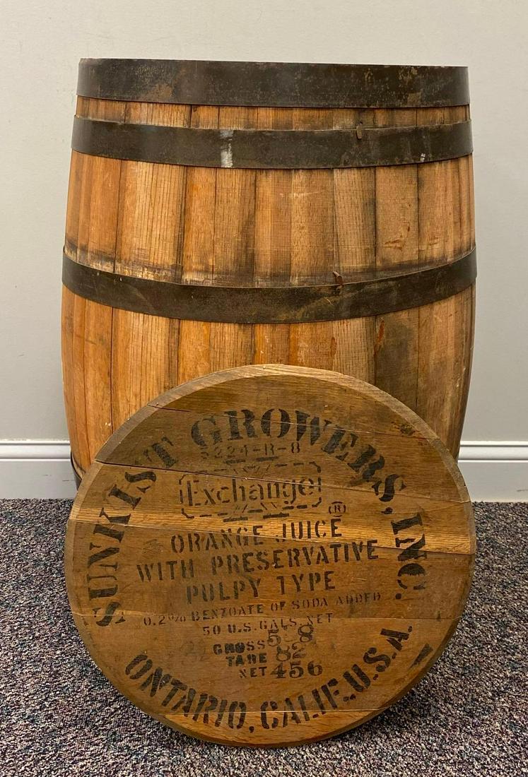 Antique Sunkist Growers Advertising 50 Gallon Wood Barrel With Lid: Ontario, California. Measures 34 1/2 x 21 1/2 inches. Lid does not stay on, wood has warped/expanded. NO IN-HOUSE SHIPPING, 3rd party shipper recommended.