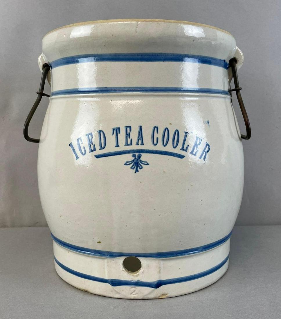 Western Stoneware Co. 2 Gallon Iced Tea Cooler: Monmouth Il. 2 handles, crack on right side. Measures 10 3/4 x 10 inches