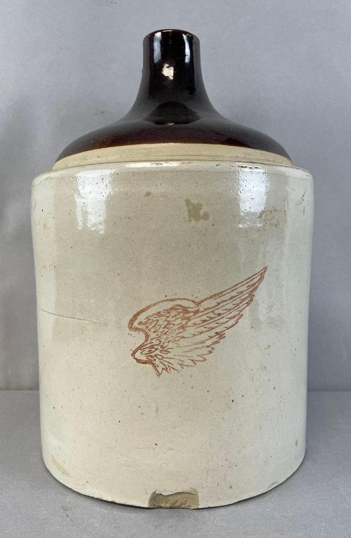 Red Wing Union Stoneware Co 2 Gallon Jug: Chip at bottom below stamp. Measures 13 1/2 x 9 inches