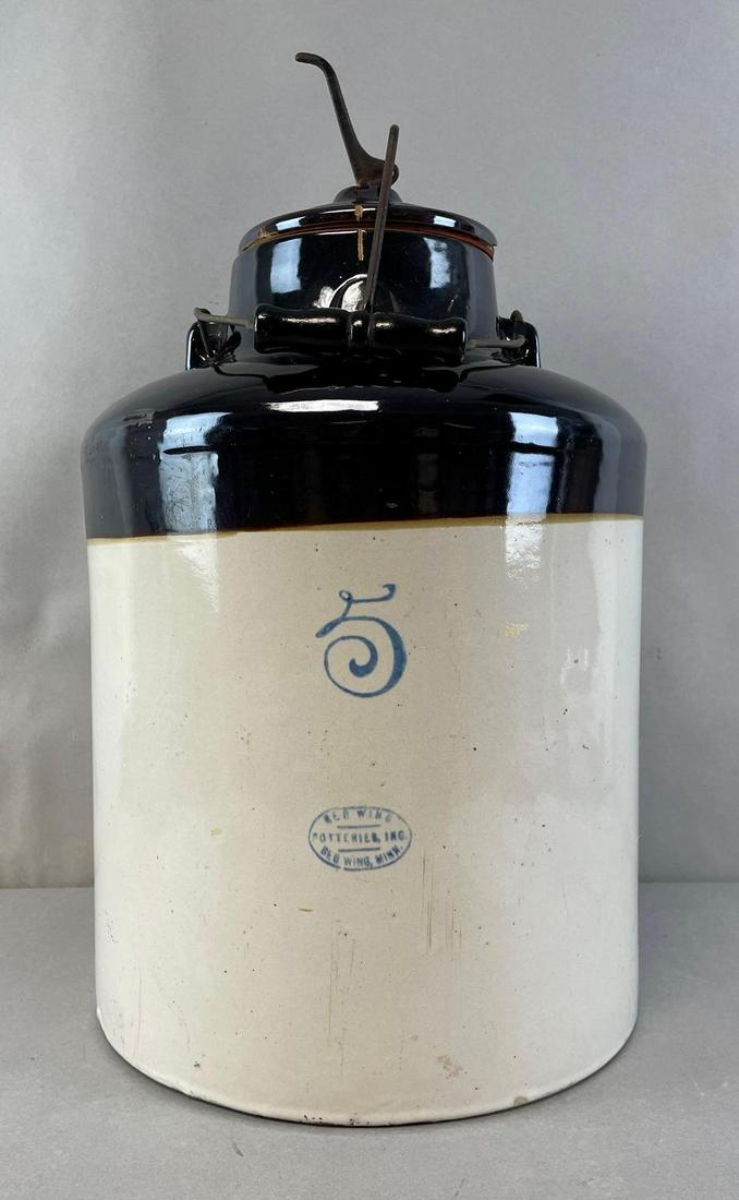 Red Wing 5 Gallon Bail Top Crock with Lid: Chip missing on inside of lid. Measures 16 x 11 3/4 inches without lid