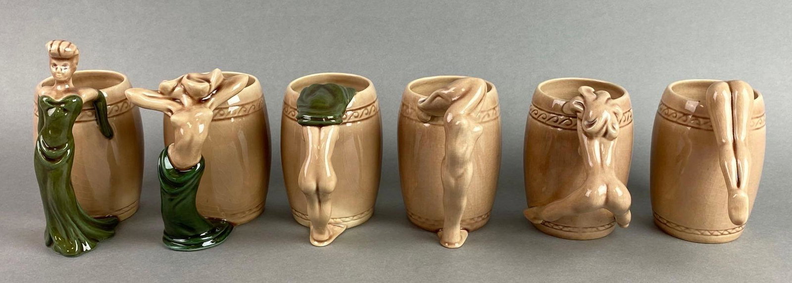 Set of 6 Dorothy Kindell Erotic Pin Up Striptease Series Mugs: Circa 1940s, bottom marked, crazing, green, largest measures 6 1/4 X 4 1/2 X 3 inches