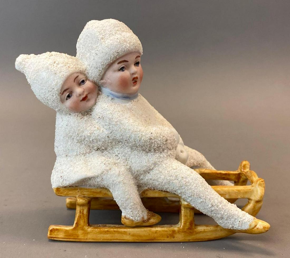 Antique German Bisque Children Sledding Snow Baby Figurine