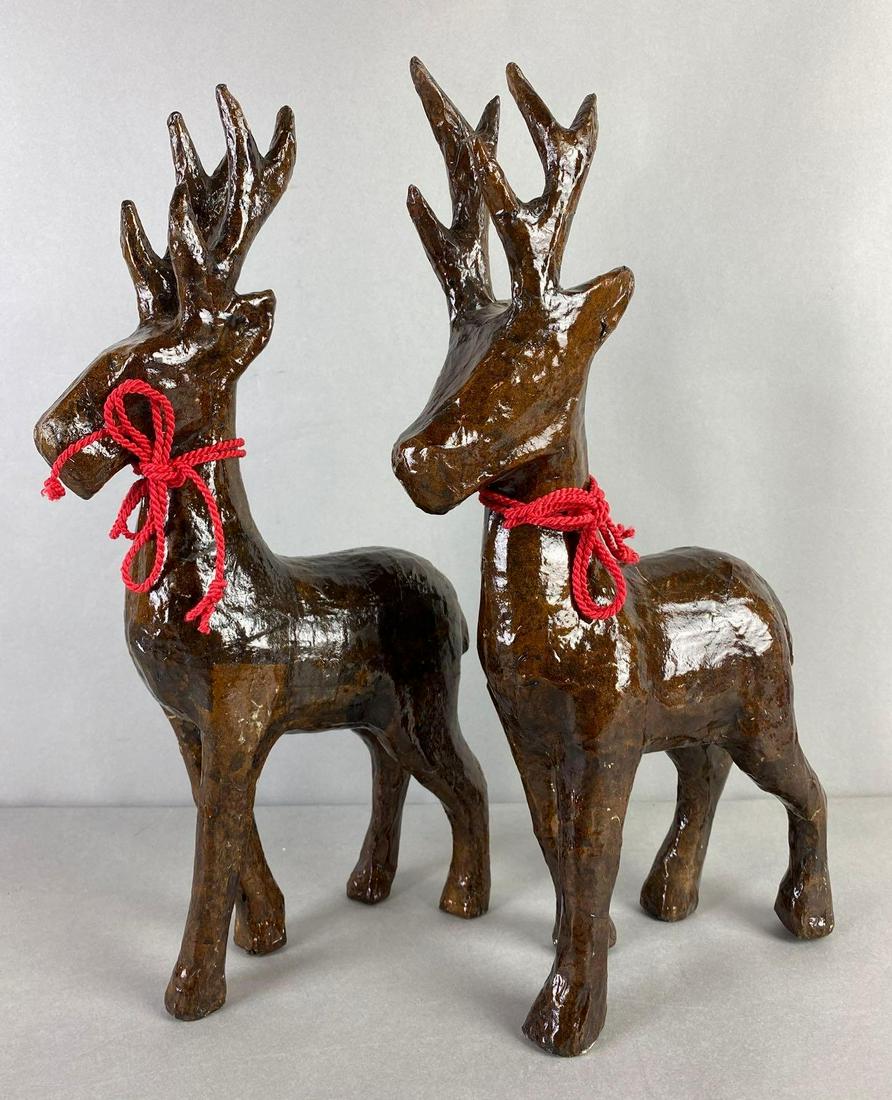 Group of 2 Paper Mache Reindeer: Unmarked, condition consistent with age, largest measures 16 1/4 X 8 X 3 inches