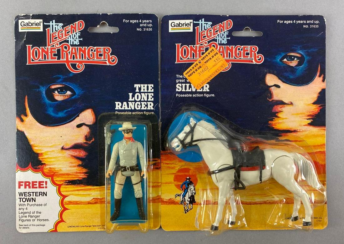 Group of 2 Gabriel The Legend of the Lone Ranger Action Figures: 1982, Includes The Lone Ranger and Silver. New in original packaging, blister is dented on Silver. Largest packaging measures 7 x 9 inches.