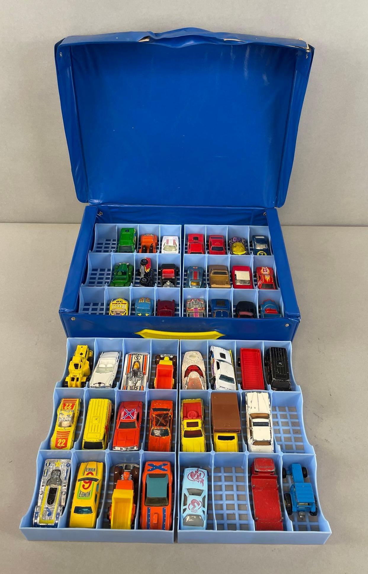 Group of 40+ Hot Wheels and Matchbox Diecast Cars: Includes Ertl dukes of Hazzard general Lee. Case measures 10 x 13 x 3 inches