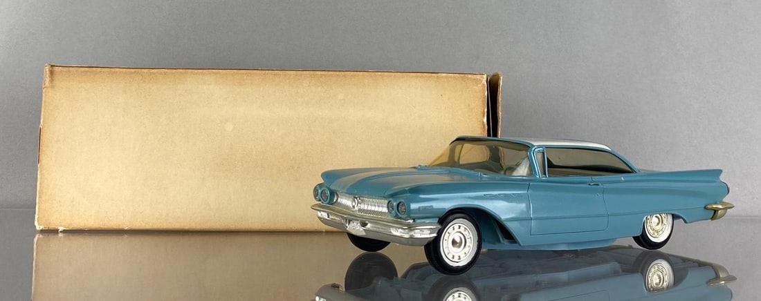 1960 Buick Invicta Dealership Promo Car: Original box, Buick Del. Arctic White and Chalet Blue, measures 8 1/2 x 3 1/4 x 2 1/4 inches