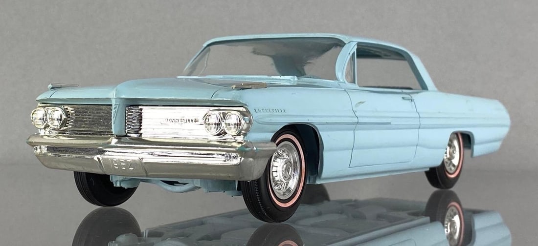 1962 Pontiac Bonneville Coaster Dealership Promo Car: Light blue, measures 8 1/2 x 3 x 2 inches, 1/25 scale.