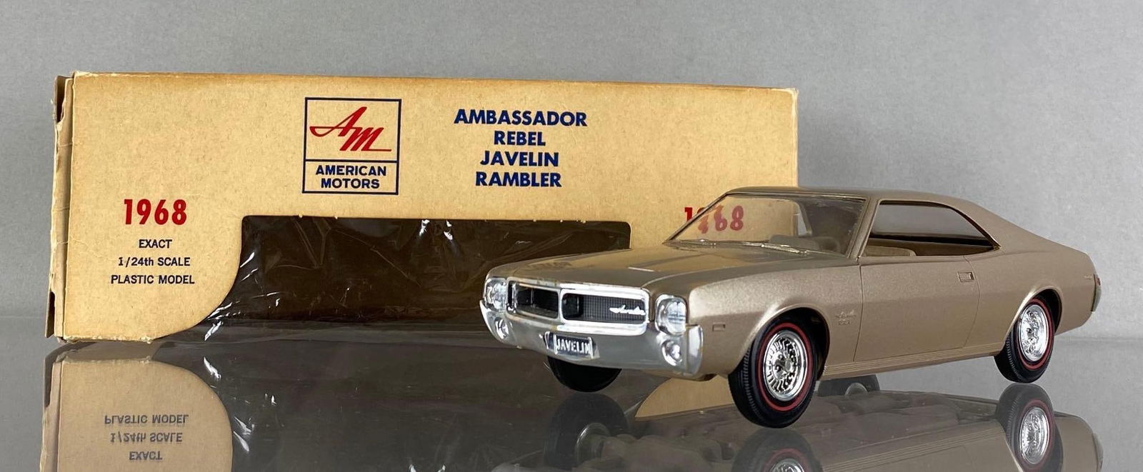 American Motors 1968 Ambassador Rebel Javelin Rambler SST Coaster Dealership Promo Car: Original box, blister is torn. Metallic Laredo Tan, measures 7 1/2 x 2 1/2 x 2 1/4 inches.