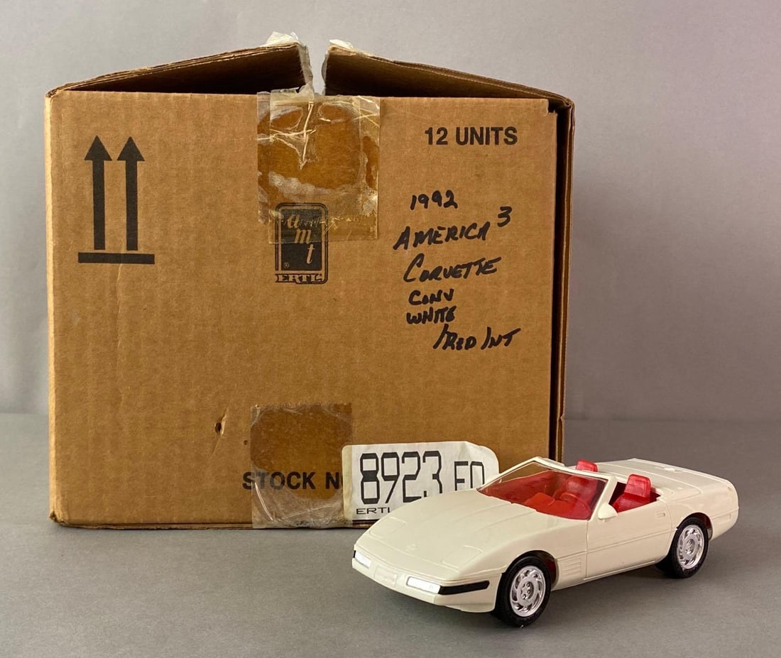 Group of 12 ERTL 1992 America Corvette Dealership Promo Cars: 1/25 scale, Original shipping box, All arctic white with red interior, No. 8923E0.