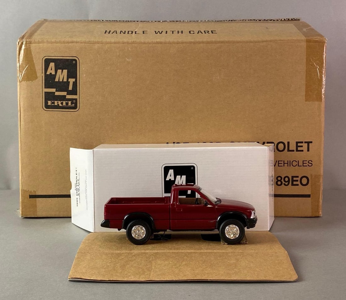 Group of 12 ERTL 1995 Chevrolet S-10 4x4 Dealership Promo Cars: 1/25 scale, Original shipping box, Cherry Red Metallic, No. 6189EO.
