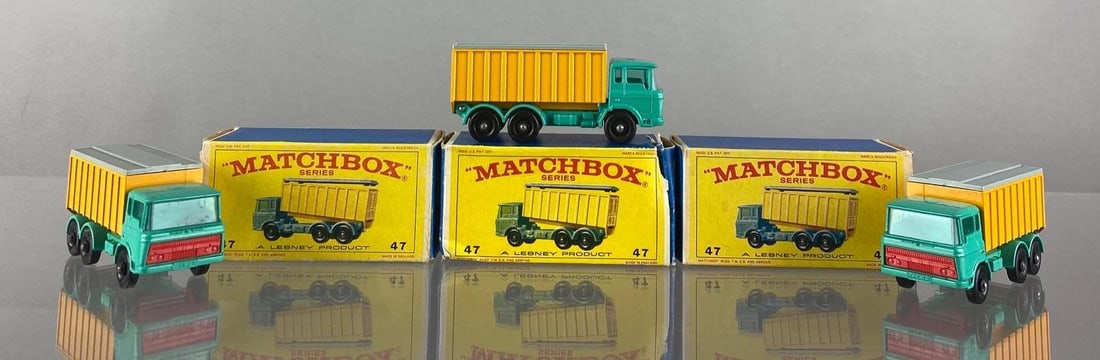 Group of 3 Matchbox No. 47 D. A. F. Tipper Container Truck: With box, Lesney, Made in England. Color: Teal/Yellow with Red Grill, Clear Windows, Gray Plastic Wheels, Die-Cast
