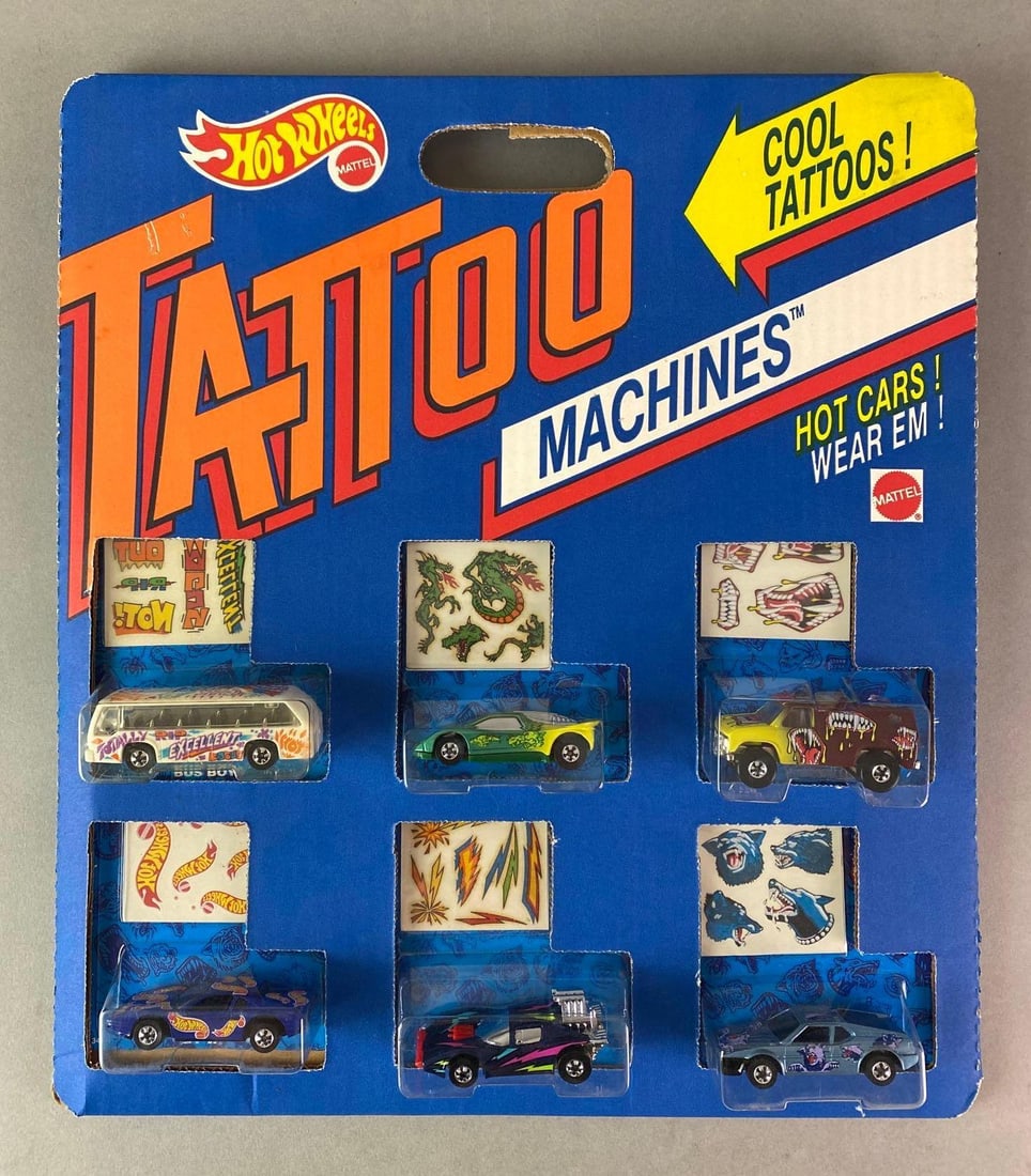 Hot Wheels Tattoo Machines Die-Cast Vehicle Pack: Mattel, Includes No. 3488 Dragon Wagon, No. 3494 Hot Wheels, No. 3510 Lightning Storm, and more, In original packaging, Packaging measures 16 x 14 x 1 3/4 inches.