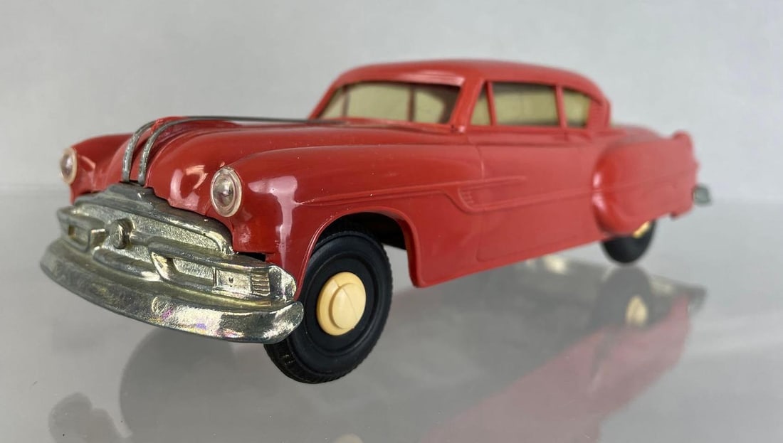 1953 Pontiac Chieftan 2 Door Hardtop Dealership Promo Car: Santa Fe red, no interior, non-friction, measures 8 x 3 x 2 1/2 inches
