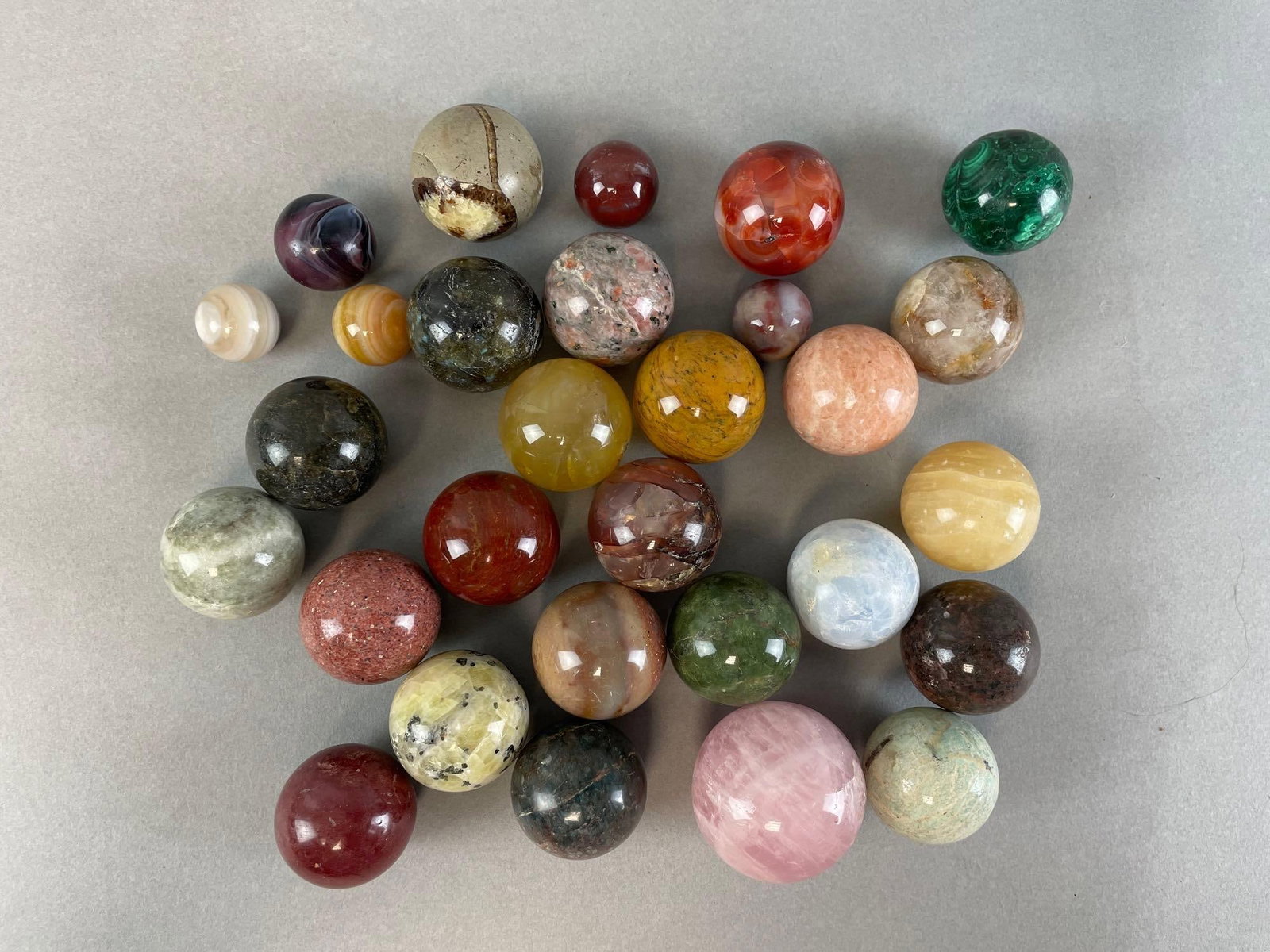 Group of 25+ Natural Stone / Agate Marbles: Largest measures 1 1/2 inches, smallest measure 3/4 inches