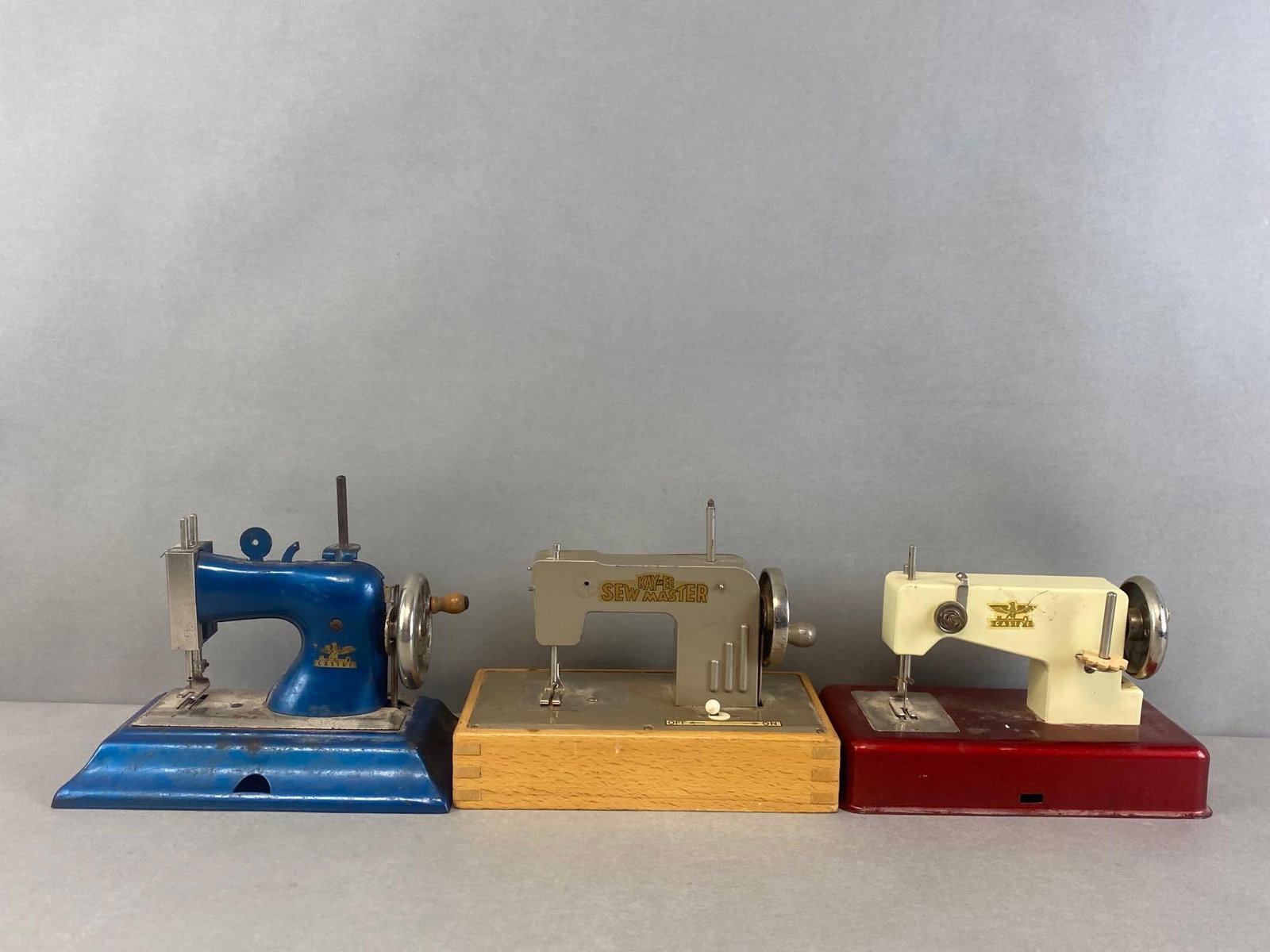 Group of 3 Miniature Sewing Machines: Includes Kay-An-EE, Casige, and Casise. All untested, largest measures 8 x 4 x 6 1/2 inches