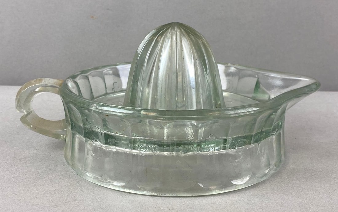 Sunkist Oranges-Lemons Glass Juicer: Measures 8 x 6 x 4 inches. Handle has large chip