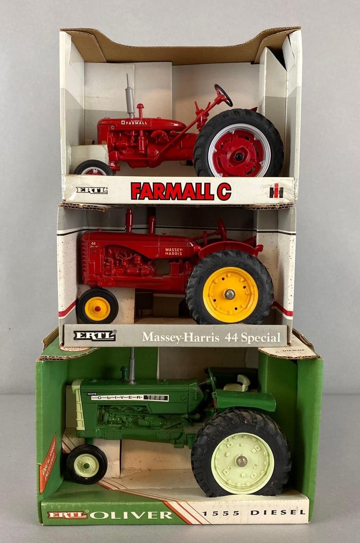 a group of 3 ERTL Die-Cast Tractors (1 of 5)