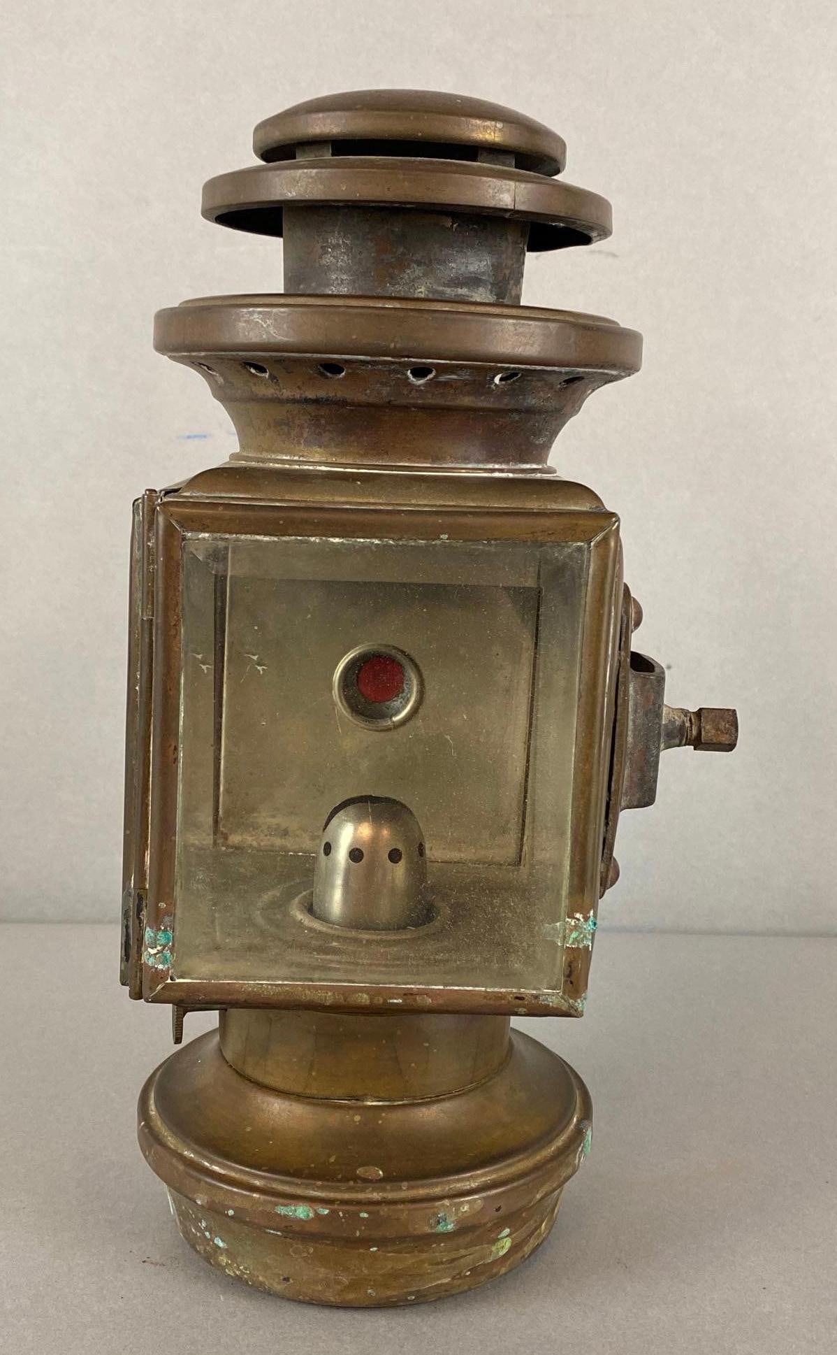 Knickerbocker Brass Goods Co. Kerosene Lamp: Untested, Some rusting around edges, Measures 11 1/2 x 6 x 4 3/4 inches.