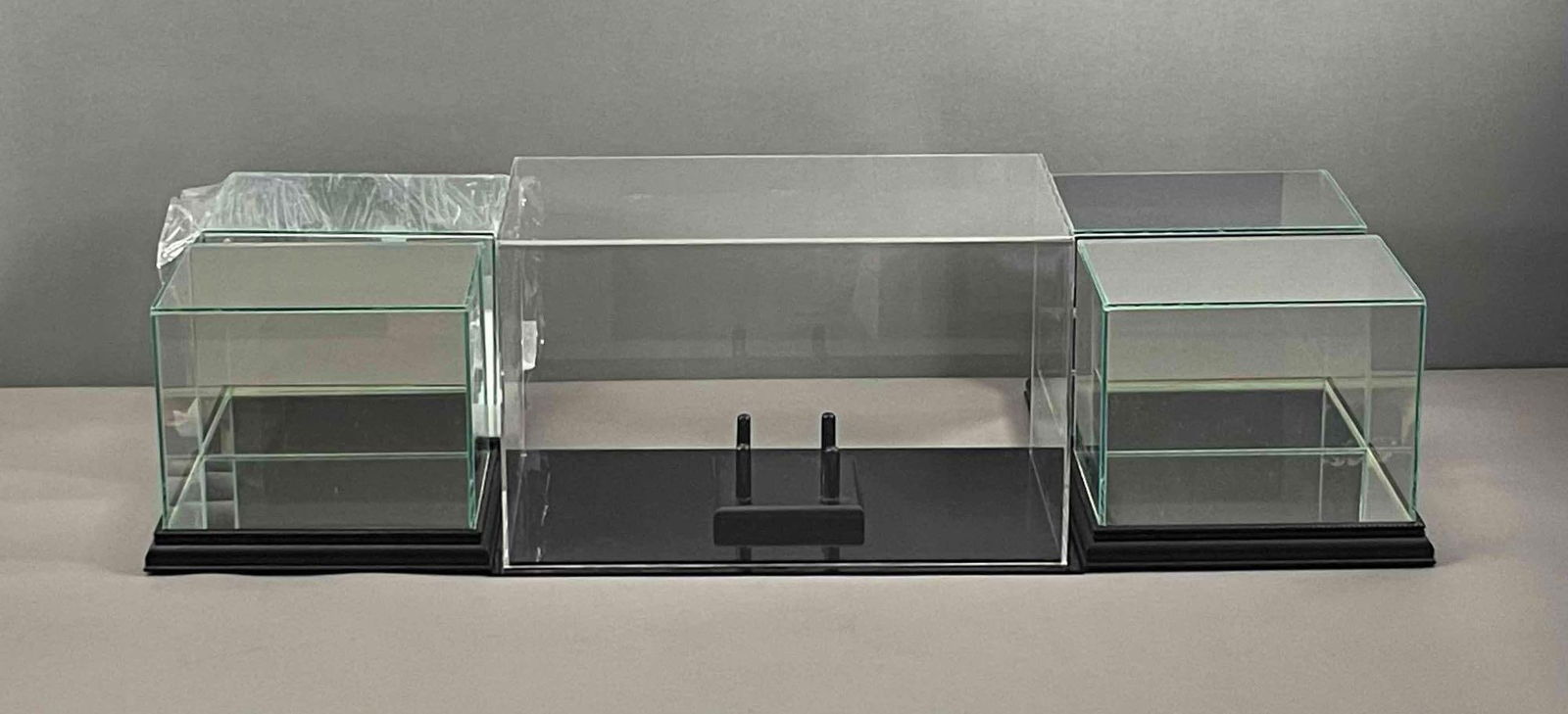 4 - Mirrored Mini Helmet Cases and 1 Football Case: The Mini Helmets measures 8 1/2 x 6 1/2 x 7 and the Football Case is 14 3/4 x 8 3/4 x 8 1/2