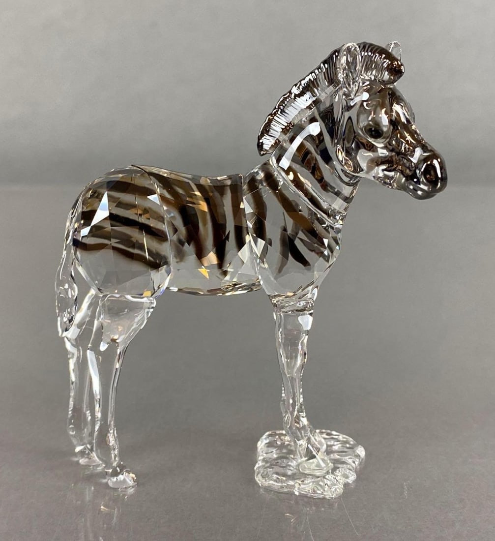 Swarovski Crystal Society Zebra Baby with Box: 2018, With certificate, Figure measures 3 1/4 x 2 3/4 x 1 1/2 inches, Box measures 5 3/4 x 5 3/4 x 2 1/2 inches.