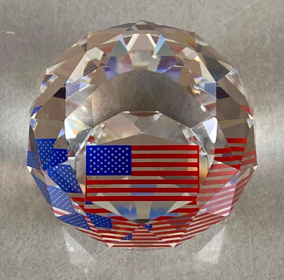 Swarovski Crystal American Flag Paperweight with Box: 2001, With certificate, Figure measures 1 1/2 x 1 1/2 x 1 3/4 inches, Box measures 3 3/4 x 3 1/4 x 2 1/2 inches.