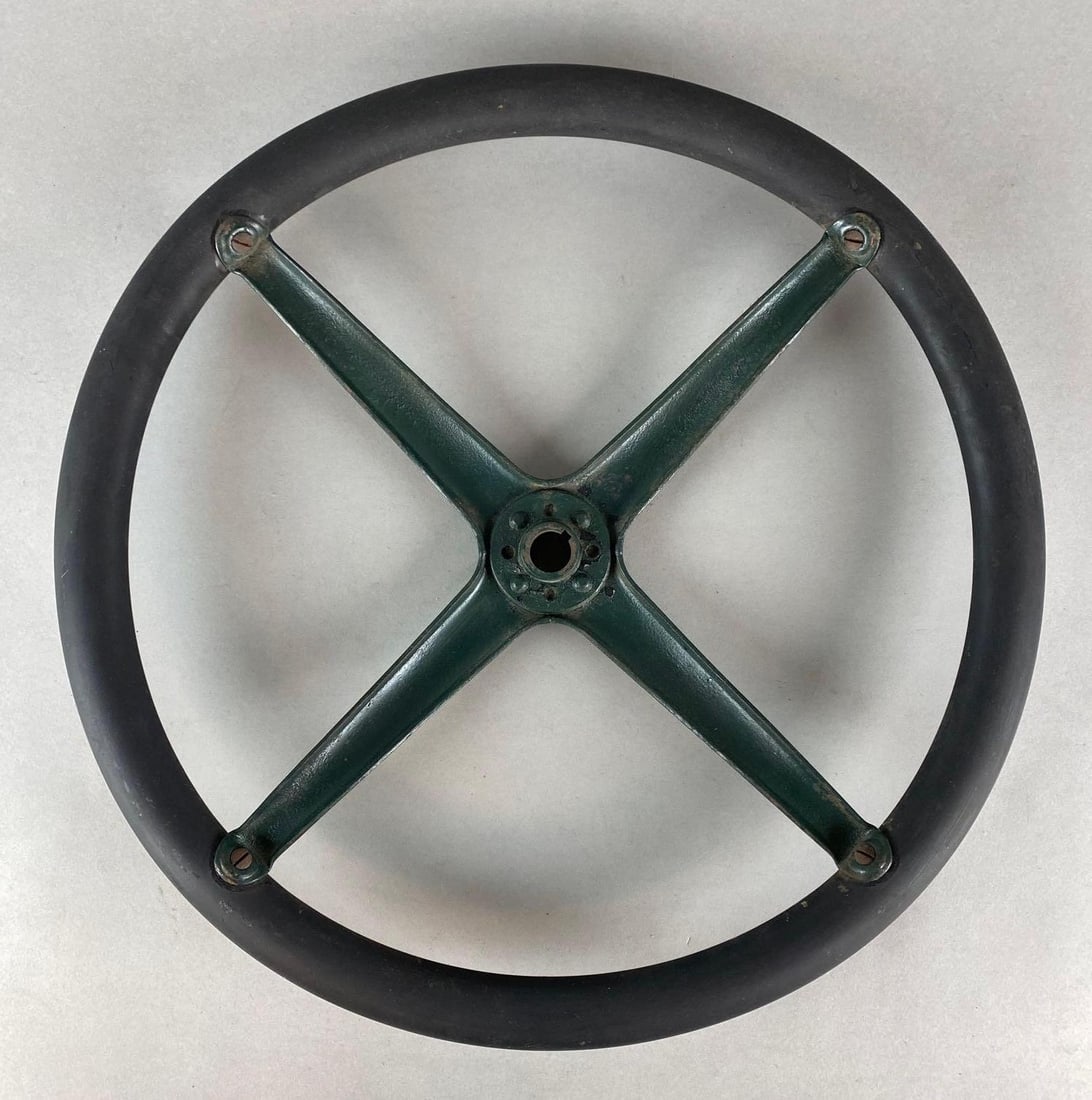 Cast Metal Automobile Steering Wheel: Measures 17 inches in diameter.
